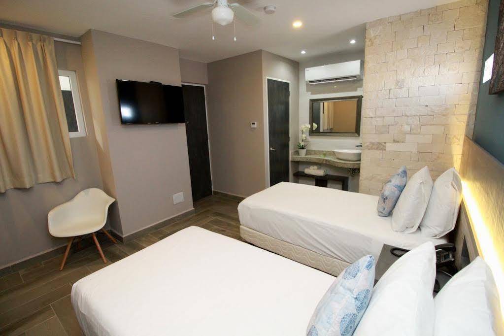 Illusion Xpress I Attraction Hotel Deluxe ปลายาเดลการ์เมน ภายนอก รูปภาพ