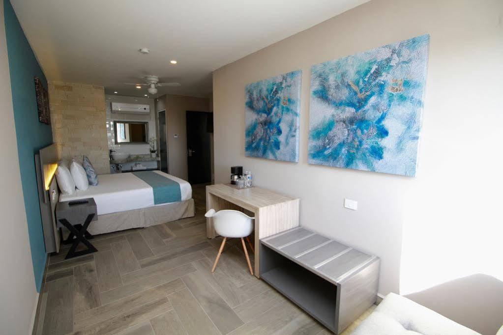 Illusion Xpress I Attraction Hotel Deluxe ปลายาเดลการ์เมน ภายนอก รูปภาพ