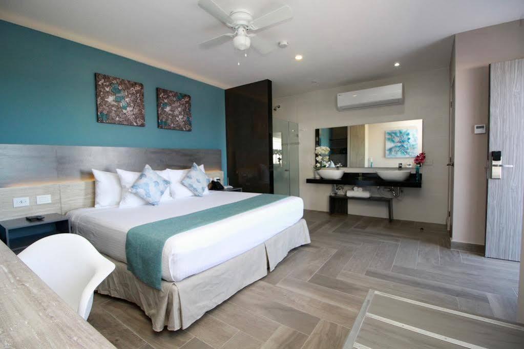 Illusion Xpress I Attraction Hotel Deluxe ปลายาเดลการ์เมน ภายนอก รูปภาพ