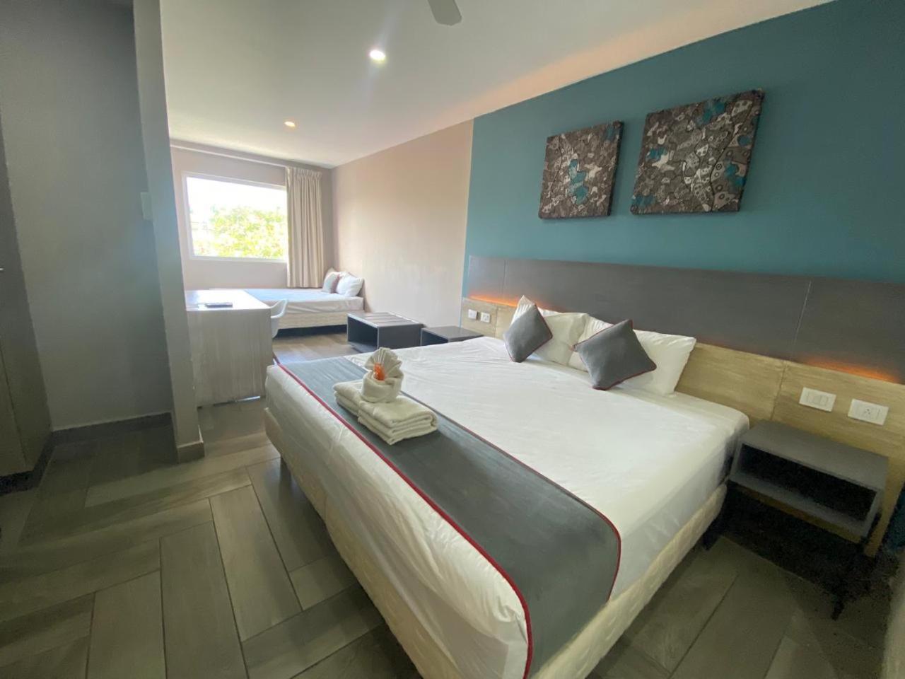 Illusion Xpress I Attraction Hotel Deluxe ปลายาเดลการ์เมน ภายนอก รูปภาพ