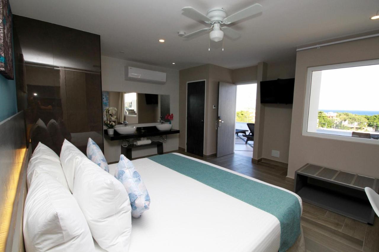 Illusion Xpress I Attraction Hotel Deluxe ปลายาเดลการ์เมน ภายนอก รูปภาพ